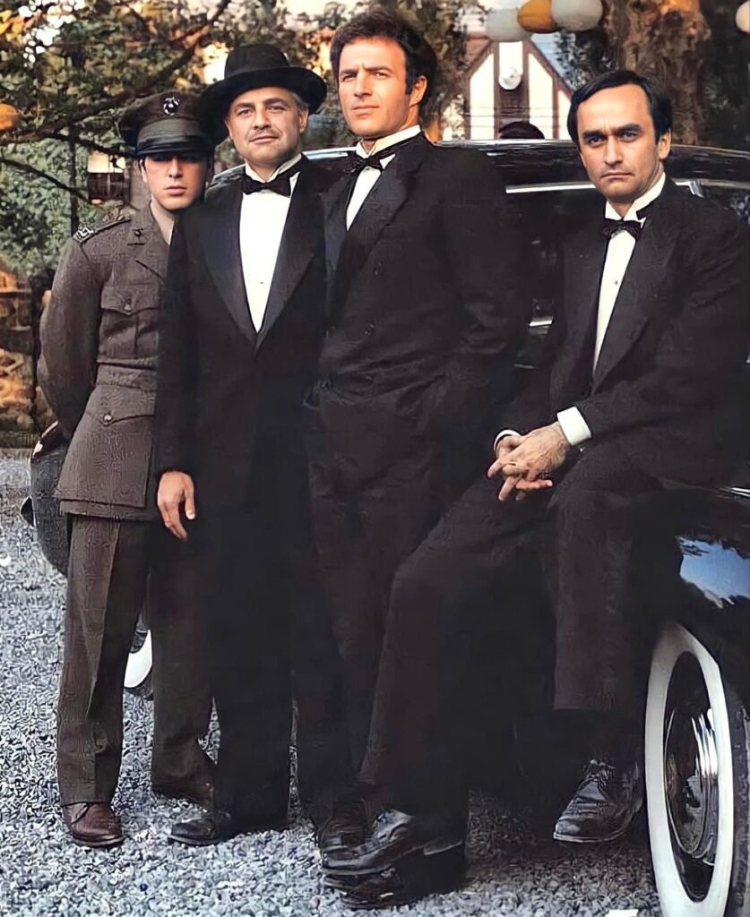 Al Pacino as Miguele "Mike" Corleone", Marlon Brando as Vito Andolini (Corleone), James Caan as Santino "Sonny" Corleone and John Cazale as Frederico "Fredo" Corleone, "The Godfather" (backstage) by Francis Ford Coppola and Mario Puzo (1972).